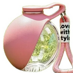 Pink portable pet water container variant with clear reservoir and pink wrist strap.