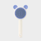 Blue bear-style self-cleaning pet grooming brush variant.