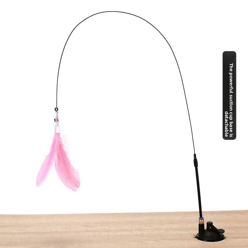 Strong-suction cat teaser variant with pink feather and flexible rod.