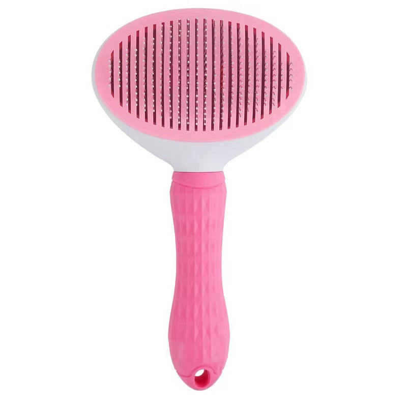 Pink round-head self-cleaning pet grooming brush variant.