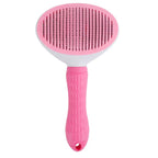 Pink round-head self-cleaning pet grooming brush variant.