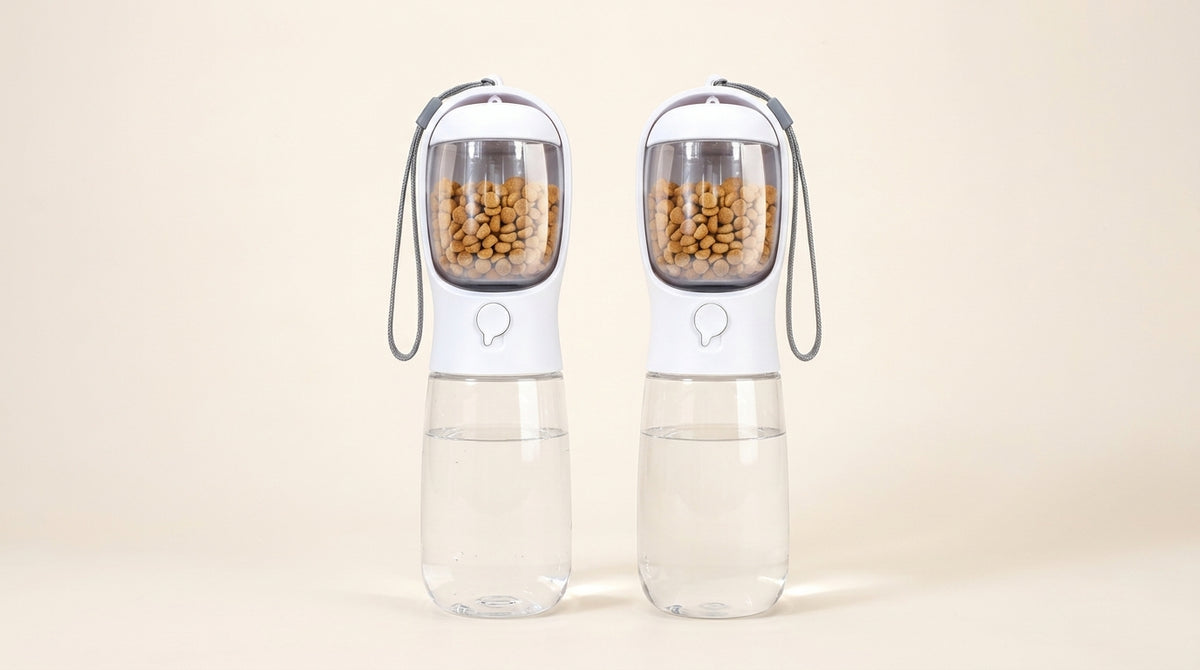 Two white pet water and food bottles with clear reservoirs, food containers and wrist straps.