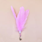 Large pink fluffy feather head variant with bell attachment.