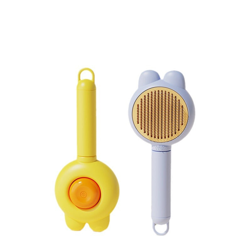 Yellow and gray pet massage and deshedding combs shown from the pin side and back-button side.