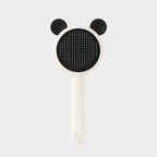 Black bear-style self-cleaning pet grooming brush variant.
