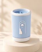 Blue pet paw cleaning cup on a cream pedestal
