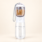White pet water and food bottle with clear food container, water reservoir and wrist strap on an ivory background.