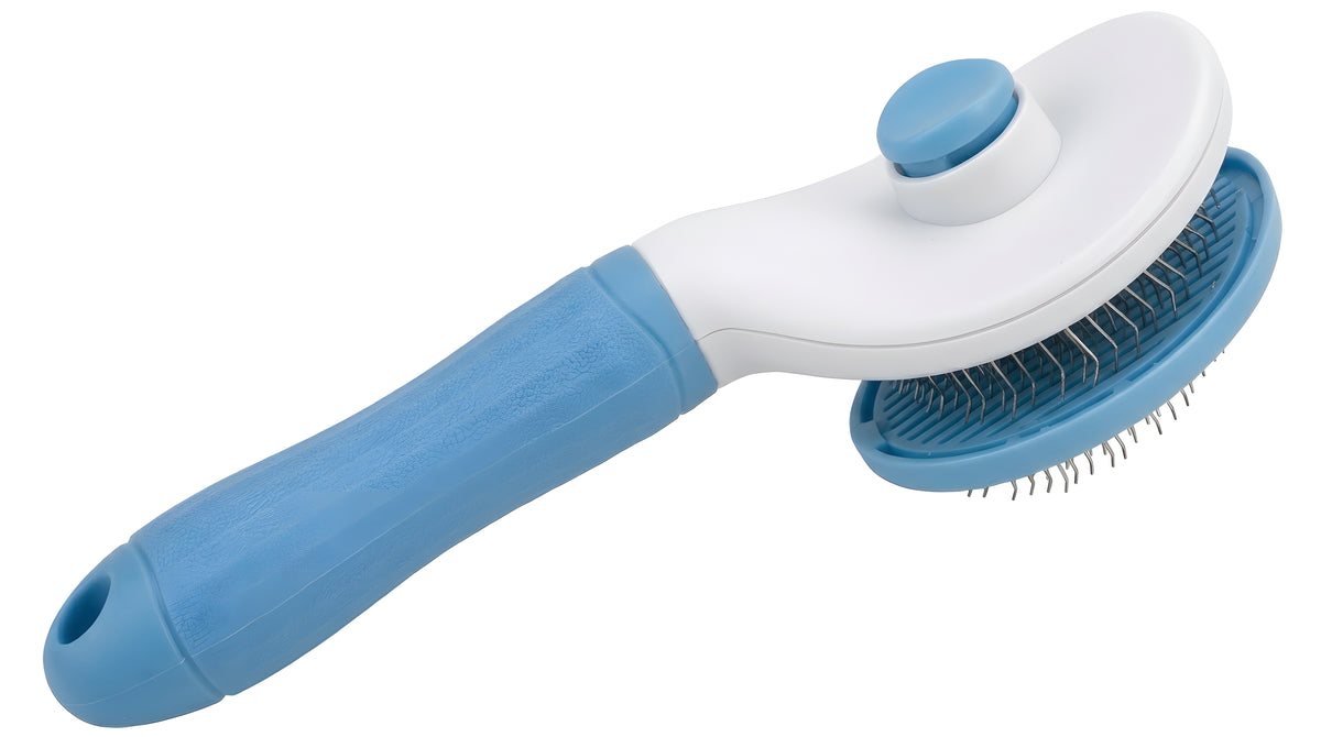 Close-up of the grooming brush hair release mechanism