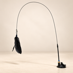 Black-feather cat teaser toy with flexible rod and suction-cup base.
